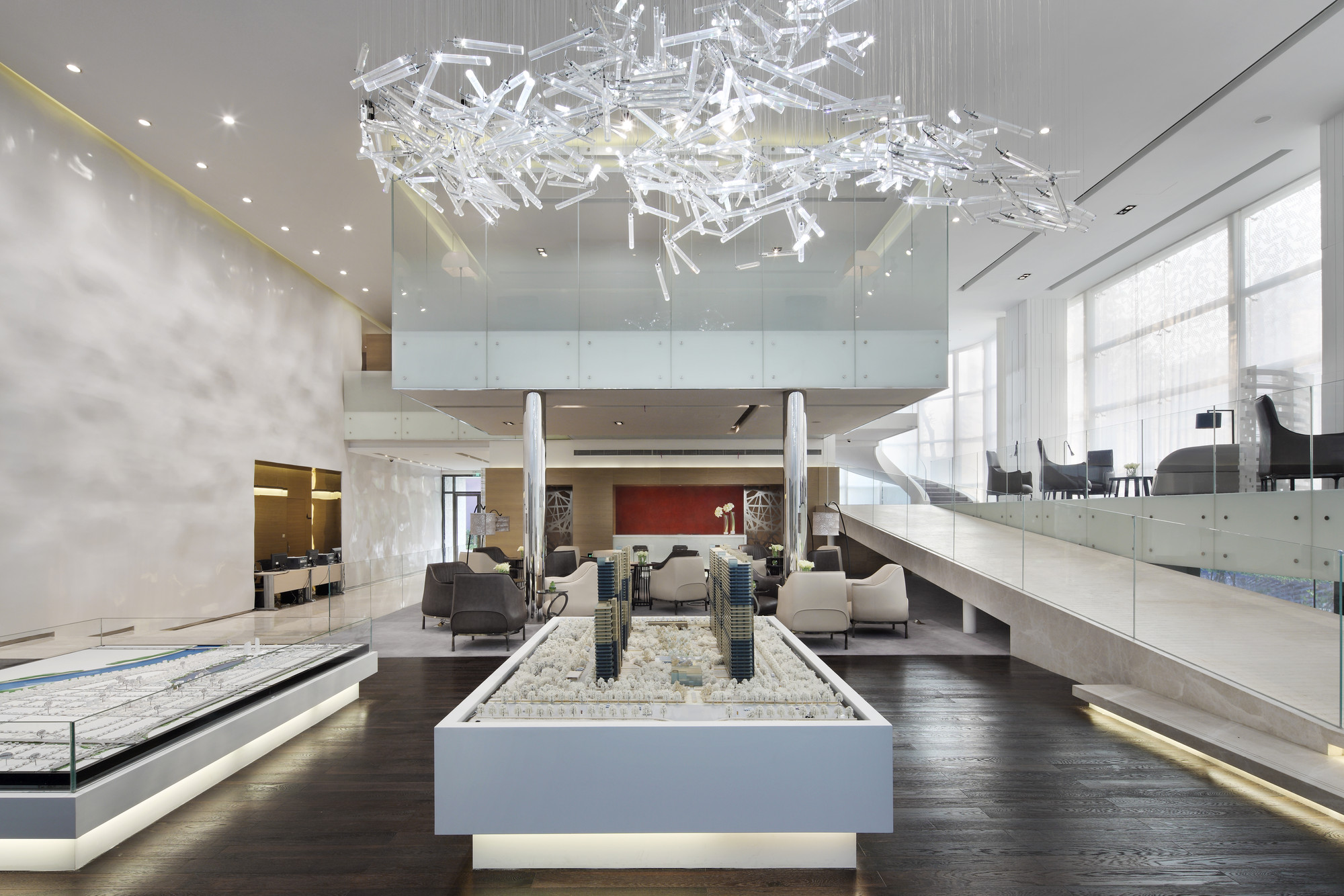 TheLume at Andaman sales gallery interior with scale model and material samples for private viewing