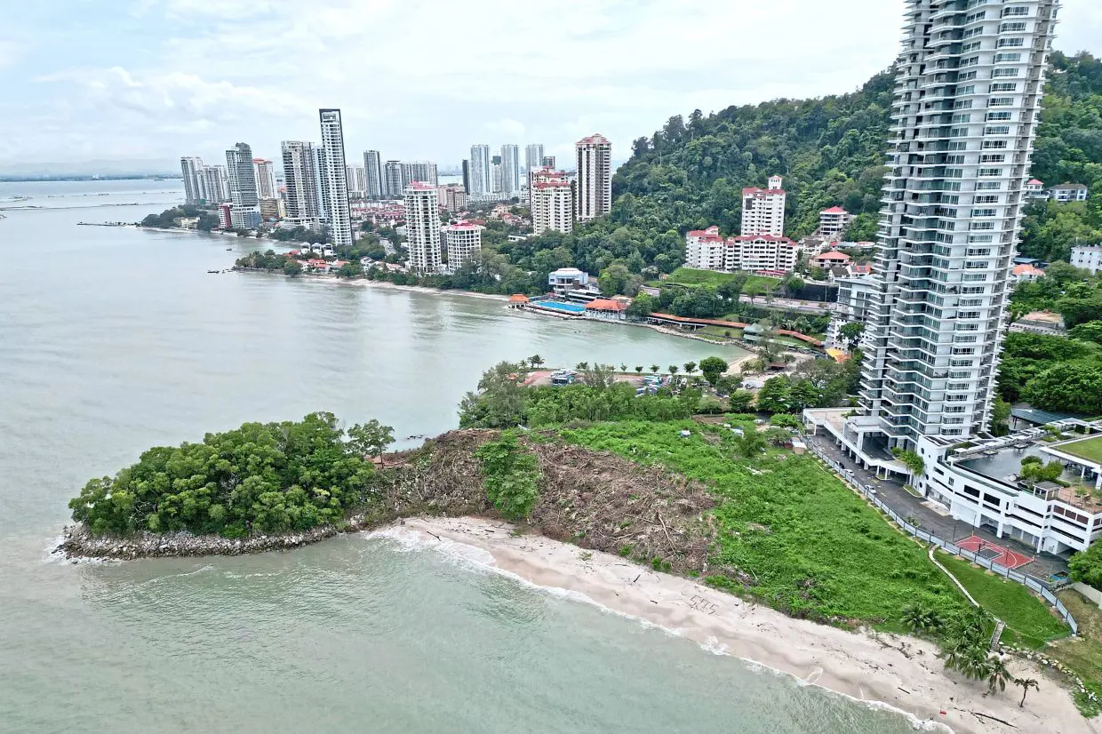 Tanjung Bungah hillside condominiums with partial sea views along Penang north coast